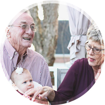 elderly couple chatting and smiling
