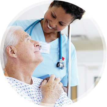 Elderly patient being taken care of by a nurse