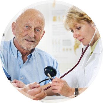 elderly man being exhamined by a female doctor