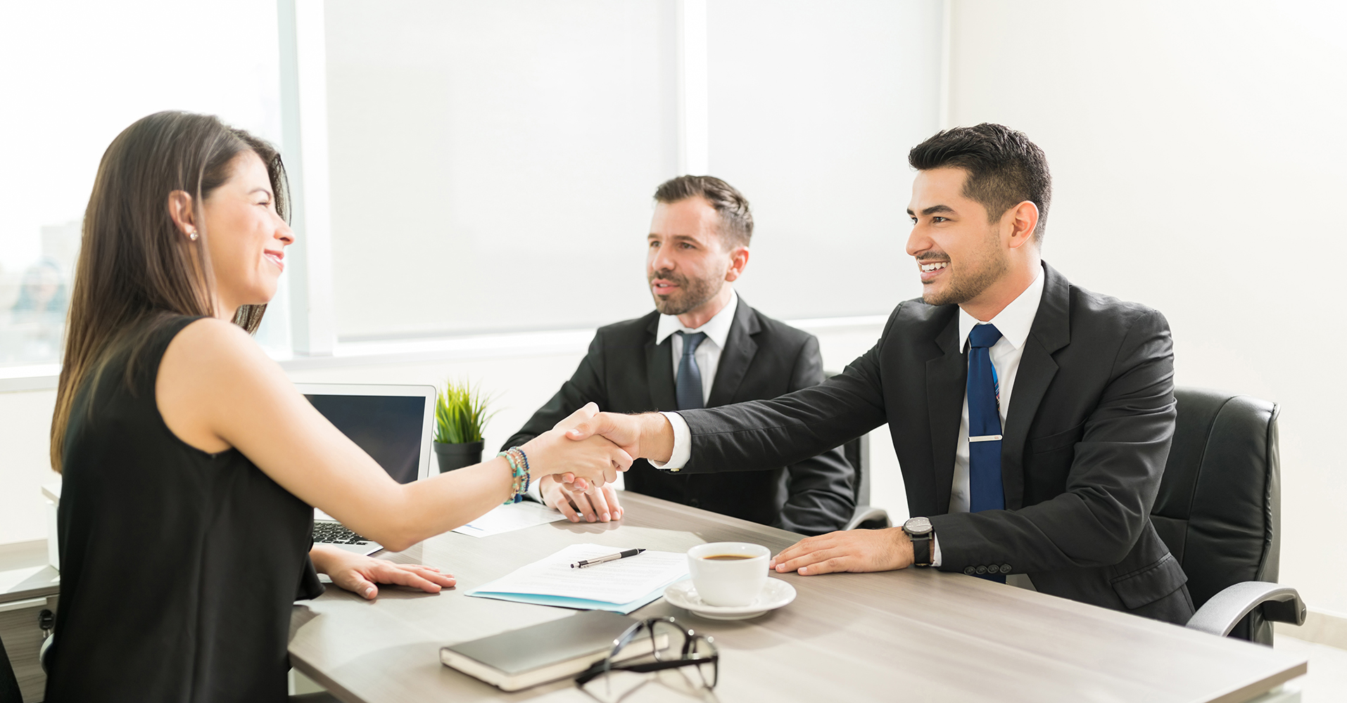 woman being hired at job interview